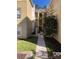 Exterior view of building showing walkway and landscaping at 413 Summit Ridge Pl # 305, Longwood, FL 32779
