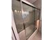 Bathroom with shower/tub combo and glass sliding doors at 556 Lake Wildmere Cv, Longwood, FL 32750