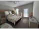 Bright bedroom with door to exterior at 556 Lake Wildmere Cv, Longwood, FL 32750
