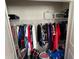 Closet with clothes hanging on rods and shelves at 556 Lake Wildmere Cv, Longwood, FL 32750