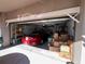 Garage with car and storage boxes at 556 Lake Wildmere Cv, Longwood, FL 32750