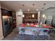 Modern kitchen with island, stainless steel appliances and pantry at 556 Lake Wildmere Cv, Longwood, FL 32750
