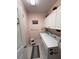 Laundry room with washer, dryer, and cabinets at 556 Lake Wildmere Cv, Longwood, FL 32750