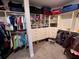 Large walk-in closet with ample shelving and drawer space at 556 Lake Wildmere Cv, Longwood, FL 32750