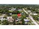 Aerial view of the house and surrounding neighborhood at 603 Conrad Dr, New Smyrna Beach, FL 32168
