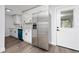 Modern kitchen featuring stainless steel appliances and teal dishwasher at 603 Conrad Dr, New Smyrna Beach, FL 32168