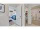 Hallway with bedroom, bathroom, and walk-in closet access at 7140 Painted Bunting Way, St Cloud, FL 34773