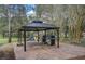 Community grills under covered pavilion at 108 Paradise Parade # 23, Davenport, FL 33897