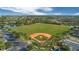 Community baseball field with parking area at 14053 Wild Majestic St, Orlando, FL 32828