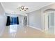 Bright living room with tile floors and access to the backyard at 14053 Wild Majestic St, Orlando, FL 32828