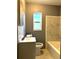 Updated bathroom with a bathtub and a vanity at 1416 34Th St, Orlando, FL 32839