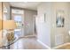 Bright and airy foyer with tile flooring and access to other rooms at 1610 Bull Hill Rd, Kissimmee, FL 34744