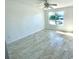 Spacious living room with tile flooring and sliding glass doors at 1815 Townhall Ln # 1815, Orlando, FL 32807