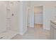 Bathroom with walk-in shower and access to a closet at 4807 Khloe Ct, Winter Haven, FL 33884