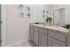 Double vanity bathroom with granite countertop at 4807 Khloe Ct, Winter Haven, FL 33884