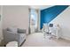 Bright home office with a comfortable armchair and built-in workspace at 4807 Khloe Ct, Winter Haven, FL 33884