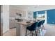 Modern kitchen with stainless steel appliances and an island at 4807 Khloe Ct, Winter Haven, FL 33884