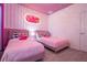 Barbie themed bedroom with twin beds at 6240 Sand Skipper Rd, Orlando, FL 32821