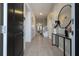 Open entryway, view to living room and staircase at 6240 Sand Skipper Rd, Orlando, FL 32821