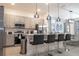 Modern kitchen with stainless steel appliances and island at 6240 Sand Skipper Rd, Orlando, FL 32821