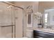 Clean bathroom with a shower, toilet, and granite countertop at 1676 Three Bars Rd, Kissimmee, FL 34744
