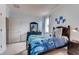 Bright bedroom with a double bed, and a coastal themed decor at 1676 Three Bars Rd, Kissimmee, FL 34744