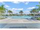 Inviting community pool with surrounding lounge chairs at 1760 Three Bars Rd, Kissimmee, FL 34744