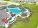 Aerial view of community pool and surrounding landscape at 1760 Three Bars Rd, Kissimmee, FL 34744