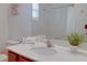 Bathroom vanity with sink and mirror at 4565 Cabello Loop, Kissimmee, FL 34746