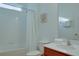 Clean bathroom with tub, shower, and vanity at 4565 Cabello Loop, Kissimmee, FL 34746