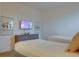 ' bedroom with twin beds, dresser, and mounted TV at 4565 Cabello Loop, Kissimmee, FL 34746