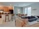 Kitchen with island, stainless steel appliances, and breakfast bar at 4565 Cabello Loop, Kissimmee, FL 34746