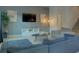 Spacious living room with sectional sofa and modern decor at 4565 Cabello Loop, Kissimmee, FL 34746