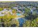 Community tennis court and pool are seen from above at 707 Saint Matthew Cir, Altamonte Springs, FL 32714