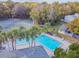 Lush landscaping surrounds this community pool and tennis court at 707 Saint Matthew Cir, Altamonte Springs, FL 32714