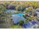 Community pool, tennis courts, and lush landscaping are featured in this aerial view at 707 Saint Matthew Cir, Altamonte Springs, FL 32714