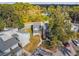 Aerial view of townhouses with parking and wooded area at 707 Saint Matthew Cir, Altamonte Springs, FL 32714