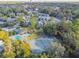 Community tennis court and pool are seen from above at 707 Saint Matthew Cir, Altamonte Springs, FL 32714