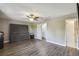 Primary bedroom with wood-look floors and ceiling fan at 707 Saint Matthew Cir, Altamonte Springs, FL 32714