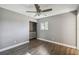 Bright bedroom with wood-look floors, neutral walls, and a ceiling fan at 707 Saint Matthew Cir, Altamonte Springs, FL 32714