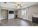 Spacious bedroom with wood-look floors and built-in shelving at 707 Saint Matthew Cir, Altamonte Springs, FL 32714