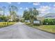 Jamestown Village entrance with paved road, landscaping, and signage at 707 Saint Matthew Cir, Altamonte Springs, FL 32714
