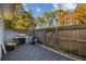 Private patio with grill and wooden fence at 707 Saint Matthew Cir, Altamonte Springs, FL 32714