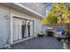Private patio with sliding glass doors and grill at 707 Saint Matthew Cir, Altamonte Springs, FL 32714