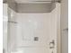 White shower with grab bars and updated fixtures at 707 Saint Matthew Cir, Altamonte Springs, FL 32714