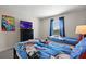 Twin bedroom with Superman theme and TV at 820 Pebble Beach Dr, Davenport, FL 33896