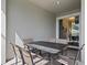 Patio with table and chairs, perfect for outdoor dining at 820 Pebble Beach Dr, Davenport, FL 33896