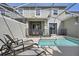 Private pool and patio with plenty of seating at 820 Pebble Beach Dr, Davenport, FL 33896