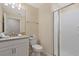 Bathroom with shower, toilet, and vanity at 830 Pebble Beach Dr, Davenport, FL 33896