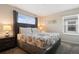 Bright bedroom with a king-size bed and plenty of natural light at 830 Pebble Beach Dr, Davenport, FL 33896
